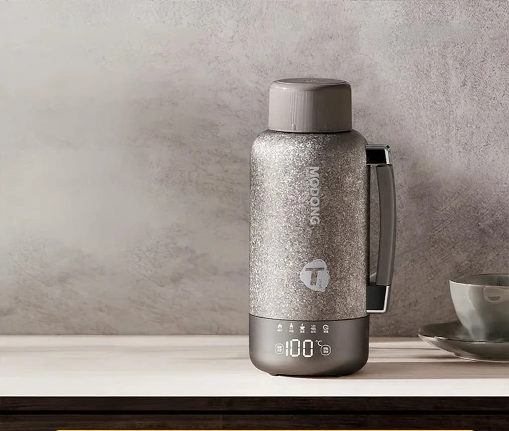Draagbare titanium elektrische verwarmingsbeker 1L dual-mode reisketel