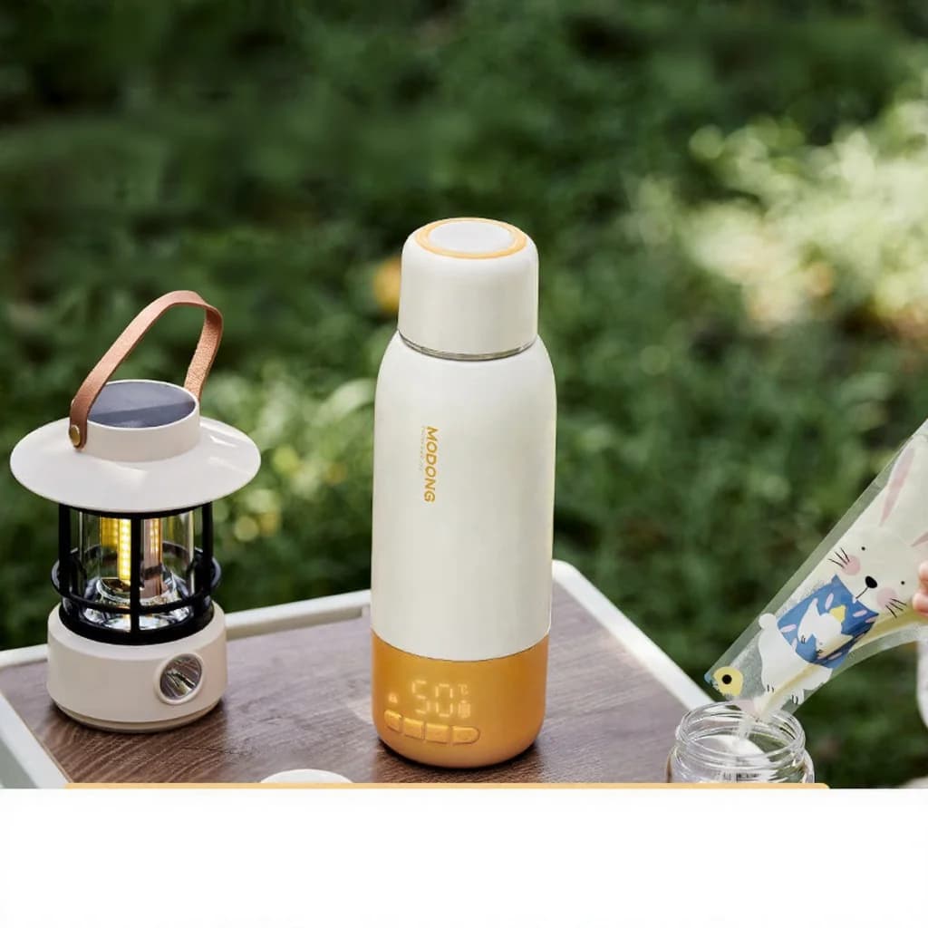 Draagbare elektrische waterverwarmingsbeker voor babymelkpoeder, 550ml