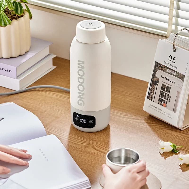 Draagbare elektrische verwarmde waterbeker 600ml 316 binnenwand vacuümgeïsoleerd