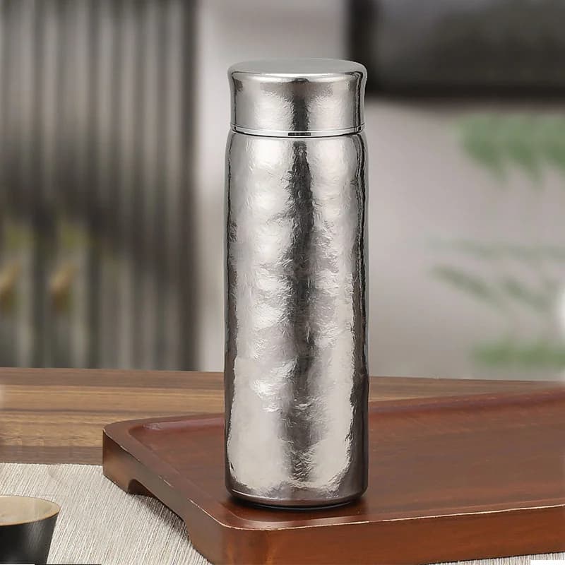 Pure titanium thermos met filter